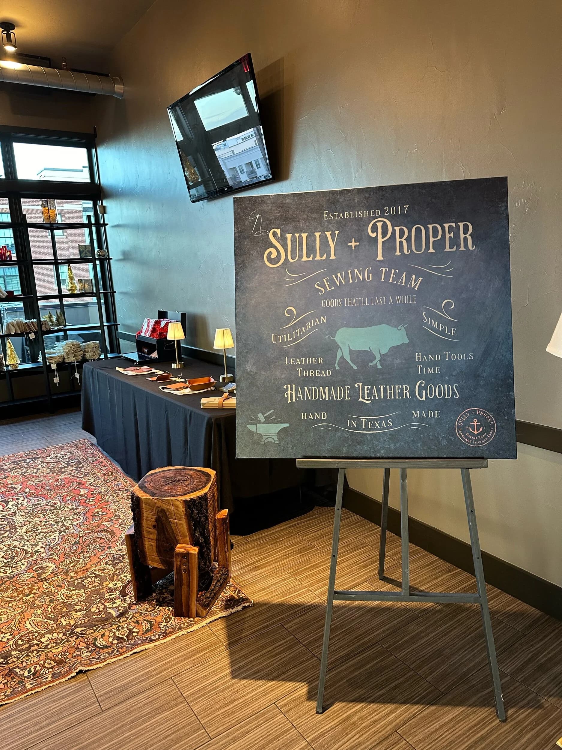 Sully & Proper branded sign at event venue